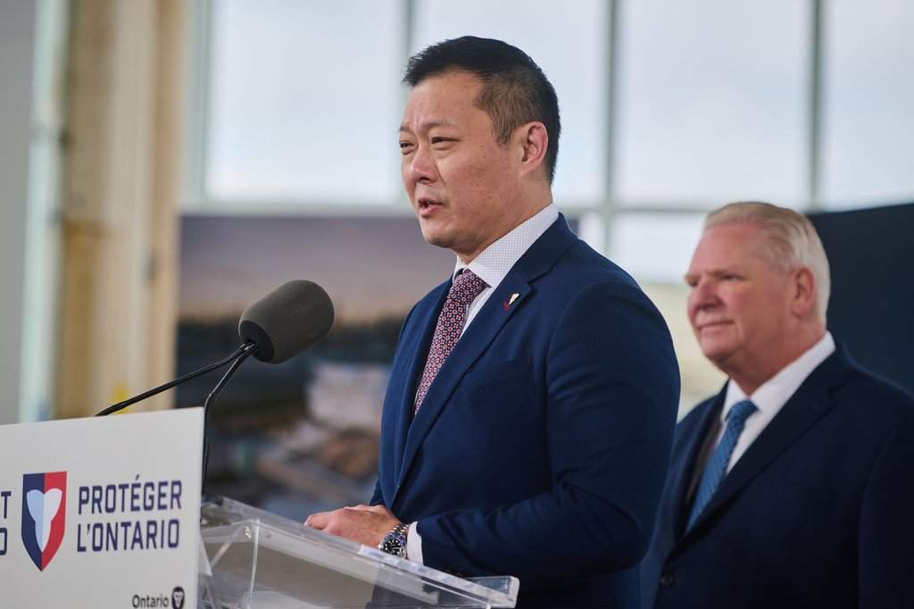 Minister of Tourism, Culture and Gaming Stan Cho, left, speaks to media alongside Ontario Premier Doug Ford at the construction site of the future Ontario Place and science centre in Toronto, on Thursday, Feb. 26, 2026. 