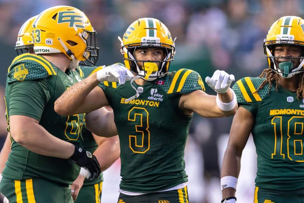 Edmonton Elks' Austin Mack (3) celebrates a first down against the BC Lions during second-half CFL football action in Edmonton on Friday, July 17, 2026. THE CANADIAN PRESS/Timothy Matwey.