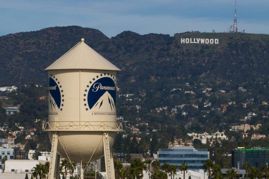 FILE - The Paramount Pictures water tower is seen in Los Angeles, Dec. 18, 2025, with the Hollywood sign in the distance. (AP Photo/Jae C. Hong, File).