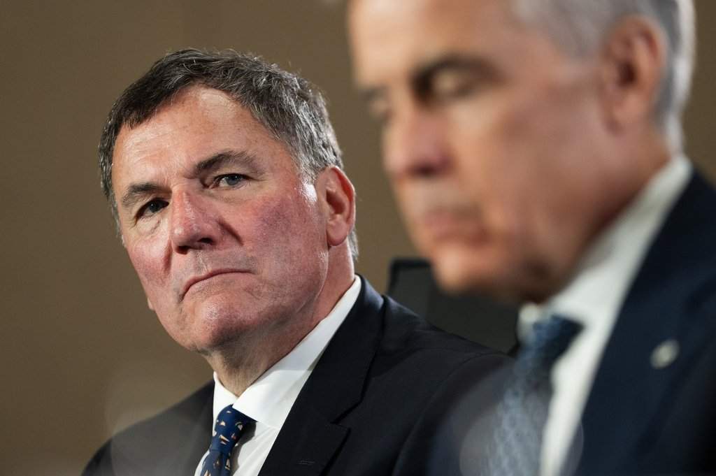 Canada-U.S. Trade Minister Dominic LeBlanc, left, listens as Prime Minister Mark Carney meets with Canada's premiers in Charlottetown on Thursday, July 23, 2026. 