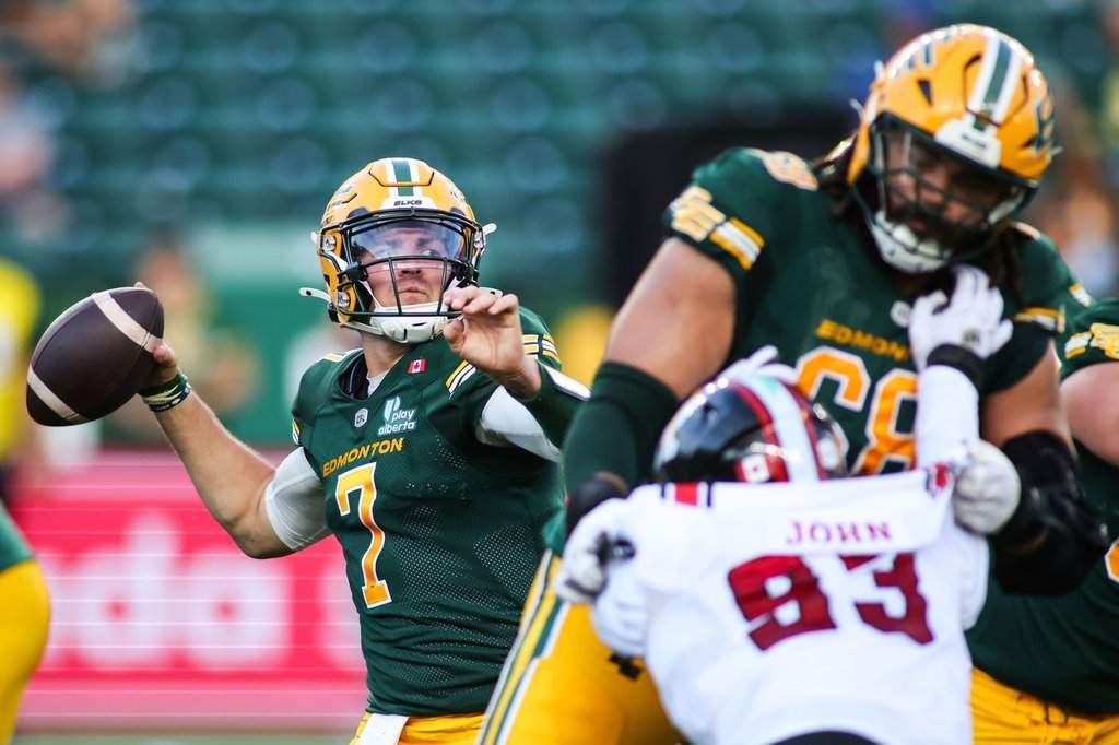 Edmonton Elks quarterback Cody Fajardo (7) throws a pass against the Ottawa Redblacks during second half CFL football action in Edmonton on Thursday, July 9, 2026. THE CANADIAN PRESS/Codie McLachlan.