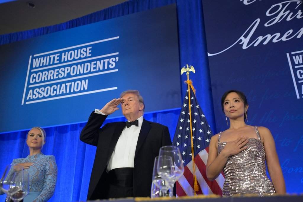 President Donald Trump attends the White House Correspondents’ Association Dinner, at the Waldorf Astoria Washington DC, Friday, July 24, 2026, in Washington, with with WHCA president Weijia Jiang, right and White House press secretary Karoline Leavitt.