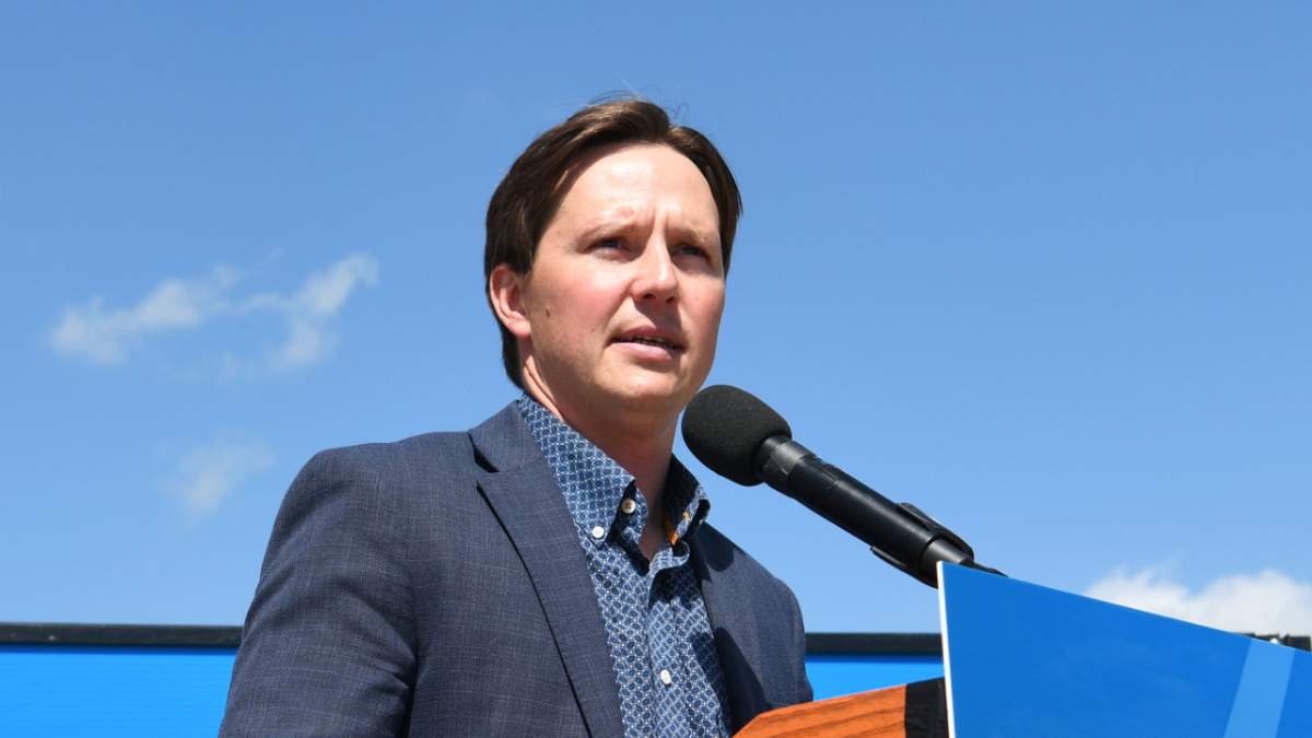 FILE: Transportation Minister Devin Dreeshen making an announcement in Airdrie on July 30, 2025.