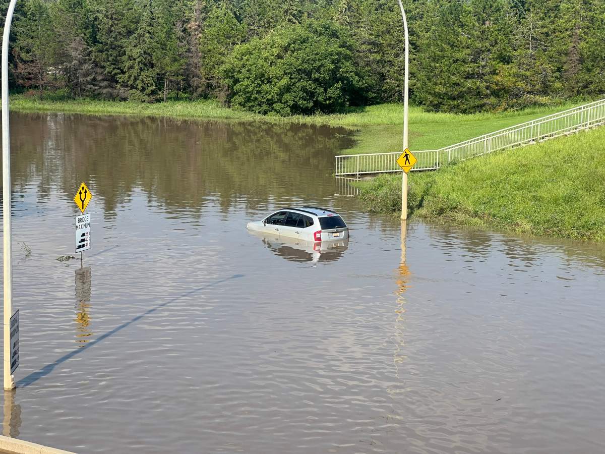 The interchange of Connors Road, Scona Road and 98 Avenue was shut down due to massive flooding from an afternoon storm in Edmonton on Monday, July 27, 2026.