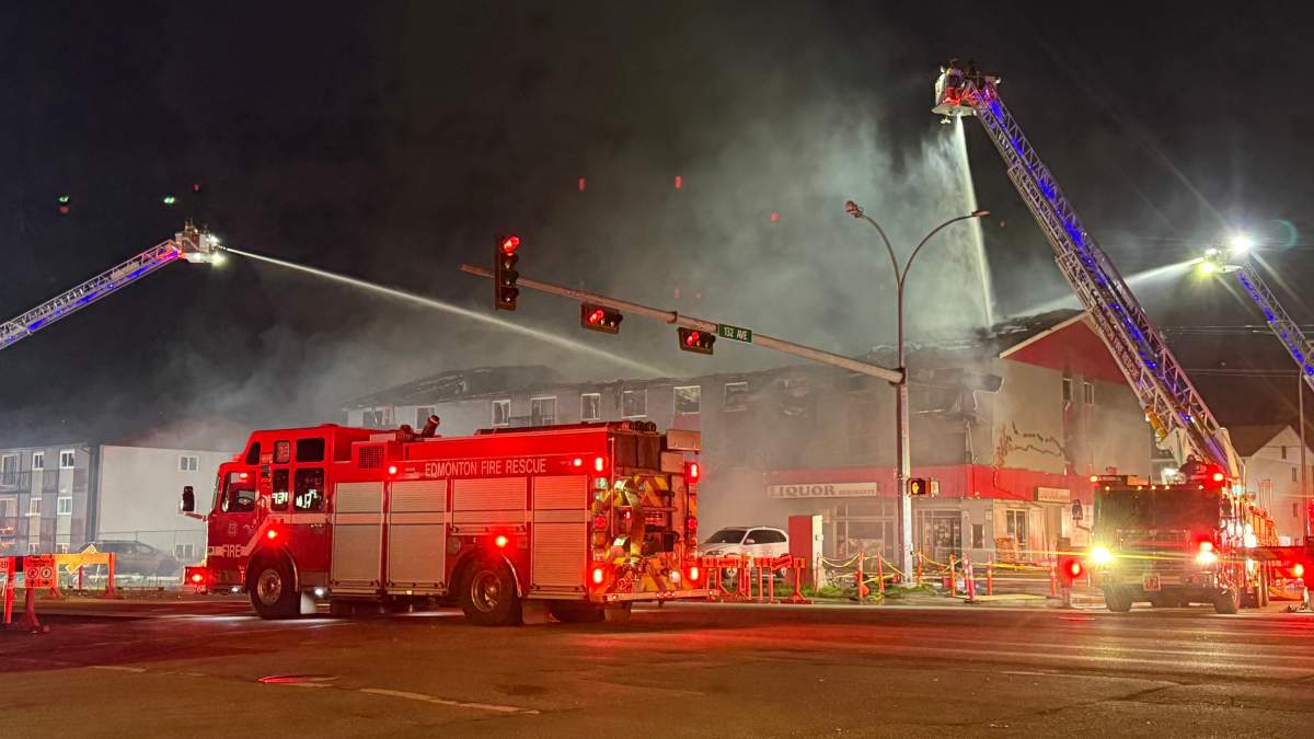 Fire crews respond to a fatal blaze at a mixed-use residential and commercial building at 13126 82 St. in northeast Edmonton on Monday, July 13, 2026.