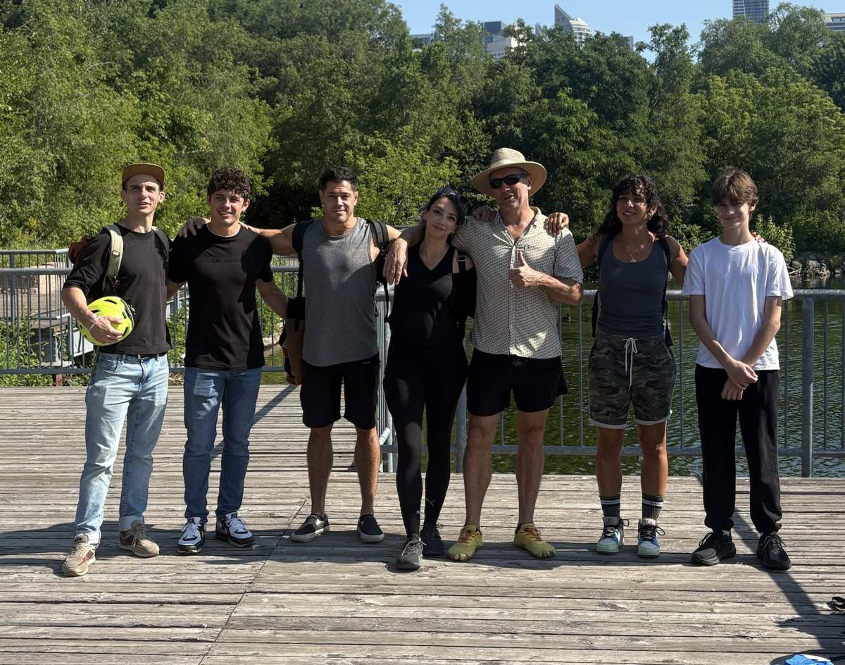 Volunteers gather at Amos Waites Park in Toronto to help pick up litter.