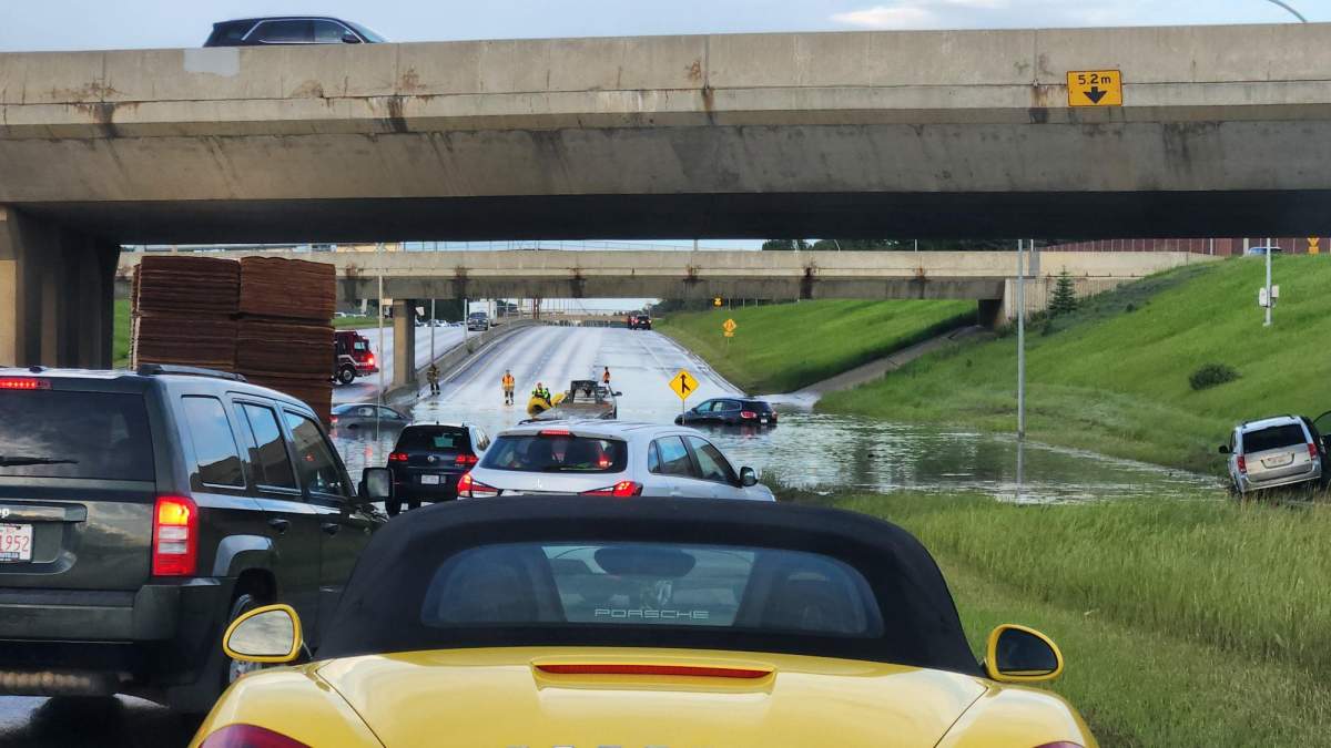 Flooding on a low section of Whitemud Drive under the 170 Street overpass in west Edmonton on Friday, July 10, 2026.