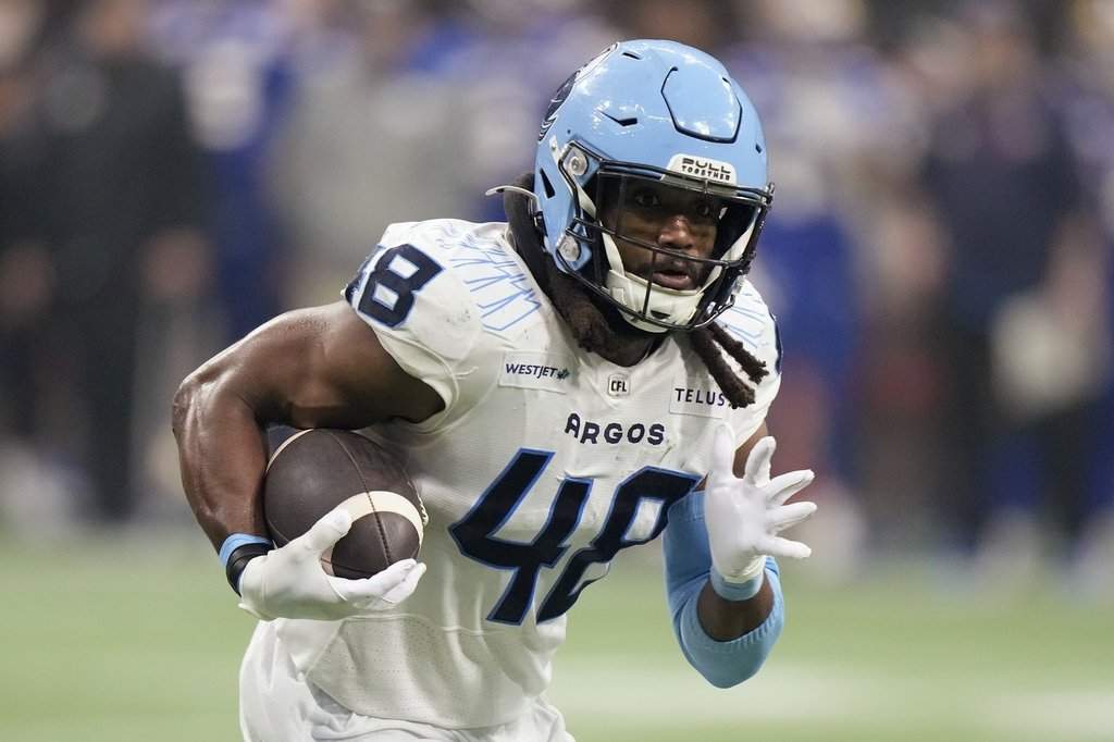 Toronto Argonauts' Wynton McManis (48) runs the ball during second half CFL football action at the 111th Grey Cup against the Winnipeg Blue Bombers, in Vancouver, B.C., Sunday, Nov. 17, 2024. THE CANADIAN PRESS/Frank Gunn.