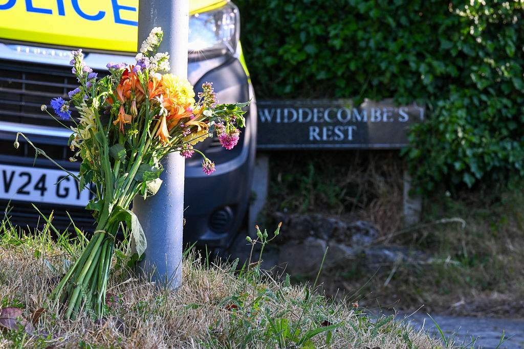 Flowers are seen outside the house of Ann Widdecombe in Haytor on July 11, 2026 in Dartmoor, United Kingdom. The former Conservative Minister and MP for Maidstone and The Weald was found dead at her home on Dartmoor on Thursday morning having sustained serious head injuries.