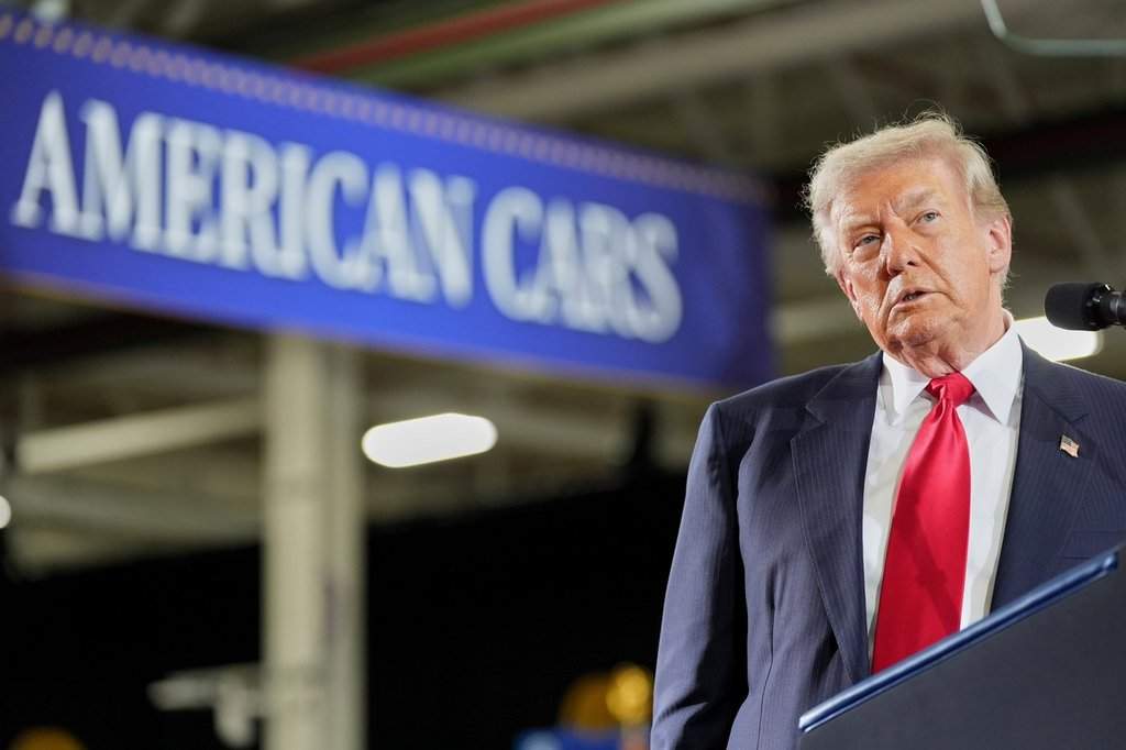 President Donald Trump pauses during a speech at General Motors proving ground, Monday, July 27, 2026, in Milford, Mich. 