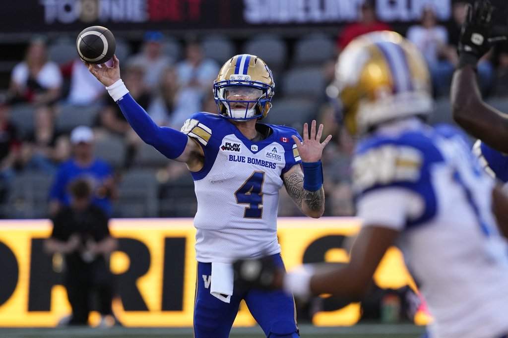 Winnipeg Blue Bombers quarterback Dru Brown (4) throws the ball during first half CFL football action against the Ottawa Redblacks, in Ottawa, Sunday, July 19, 2026. THE CANADIAN PRESS/Justin Tang.