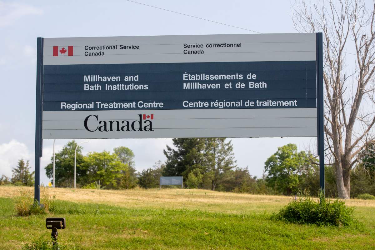 A sign for the Millhaven and Bath Institutions is pictured outside of the facility in Millhaven, Ont., on June 10, 2023.