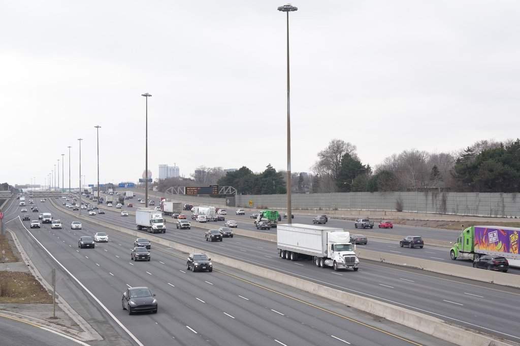 Traffic uses  401 Highway in Toronto on Wednesday, January 3, 2024. 