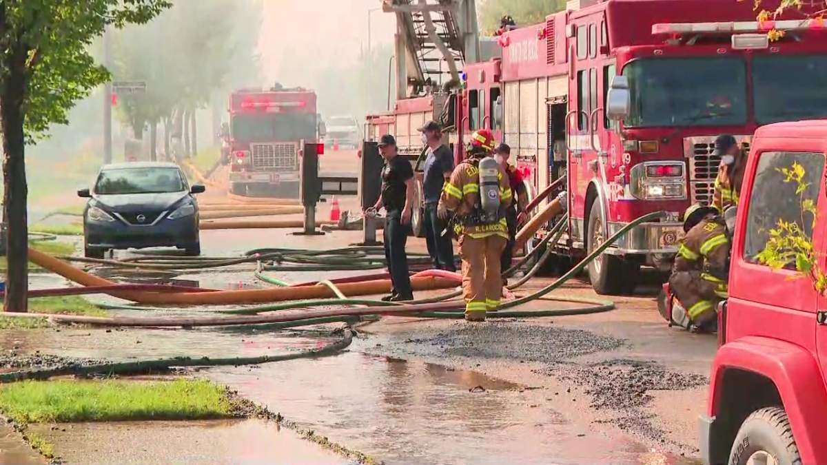 Fire damaged several homes on Cameron Ravine Way in southwest Edmonton's Cameron Heights neighbourhood on Tuesday, July 14, 2026.