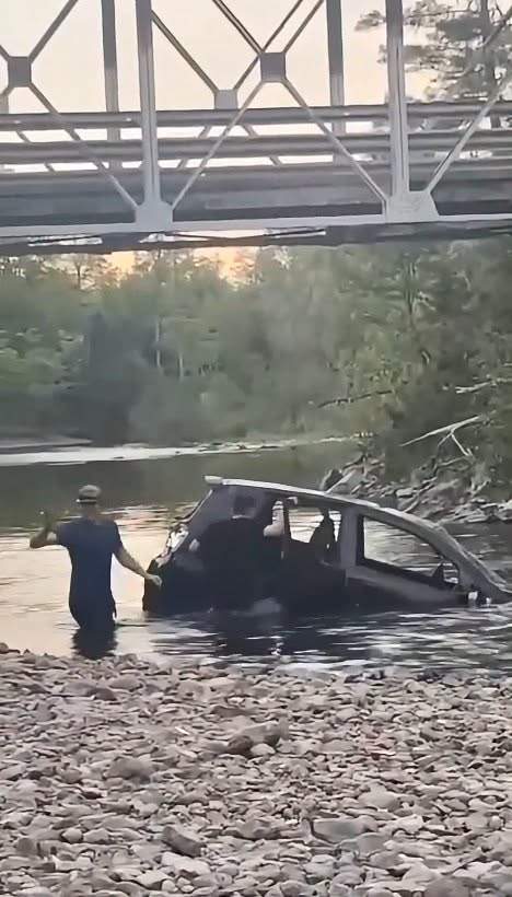 RCMP released stills from the videos that they say show two men purposely driving a vehicle into the Charlo River.