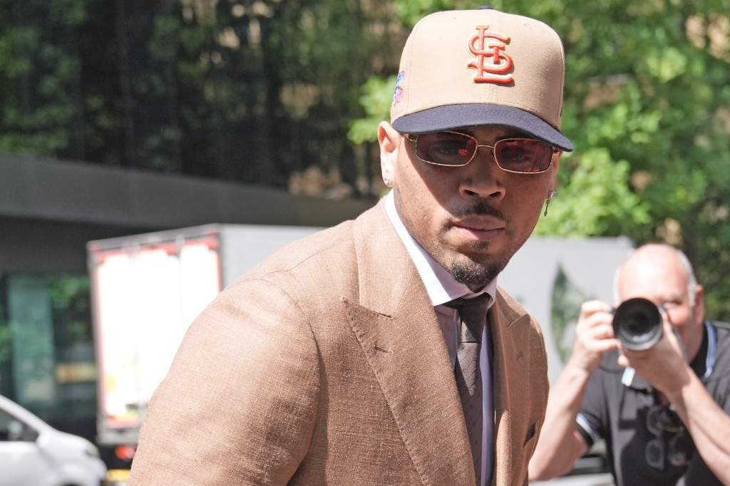 Chris Brown arrives at Southwark Crown Court, where he is charged over an alleged assault in a London nightclub, in London, Friday, July 24, 2026.