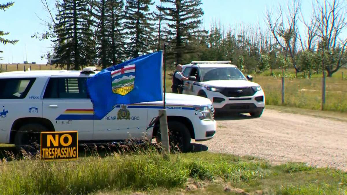 The property, seen here with the driveway blocked off by the RCMP, is located on 112 Street East, just north of the town of High River.