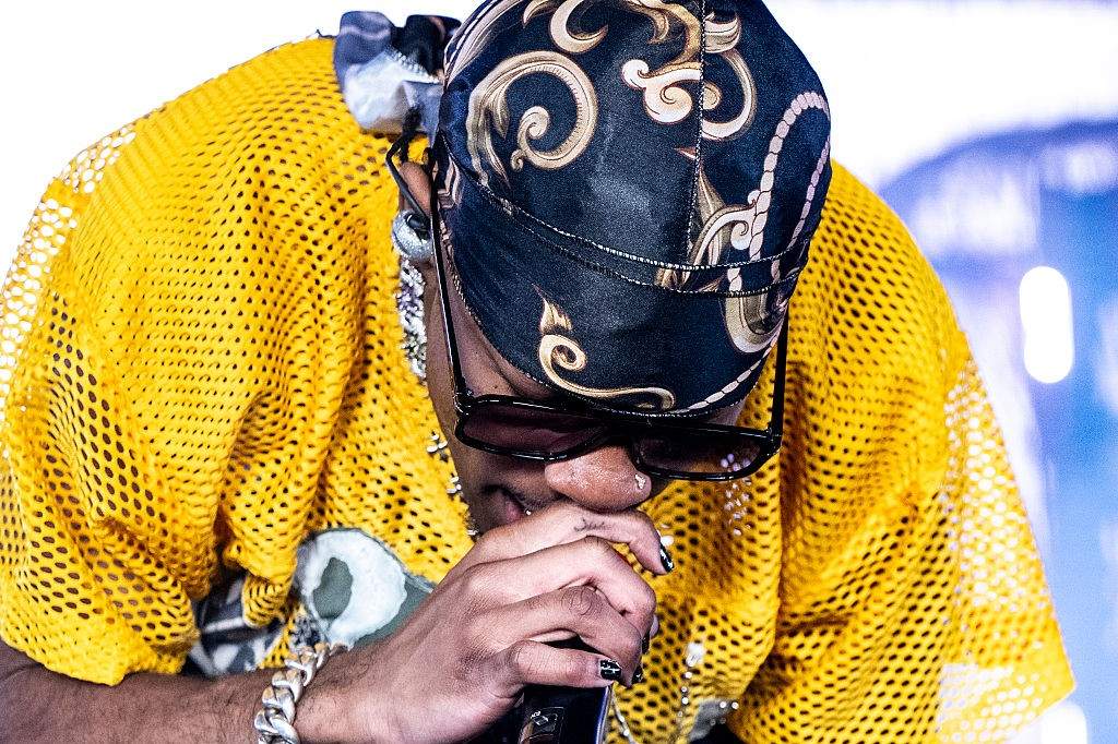 Singer d4vd, right finger "Shhh" tattoo detail, performs onstage during Day 1 of Coachella Valley Music and Arts Festival on April 18, 2025 in Indio, California.