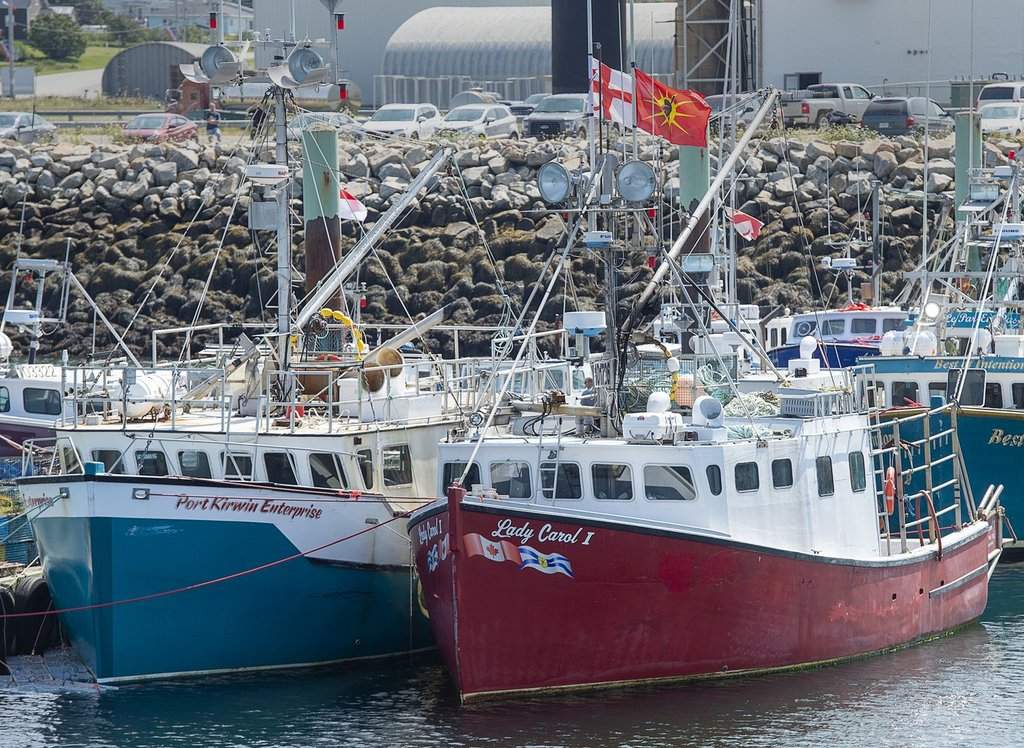 Fishing boats from the Sipekne'katik First Nation prepare for the start of its self-regulated treaty lobster fishery in Saulnierville, N.S. on Monday, Aug. 16, 2021. THE CANADIAN PRESS/Andrew Vaughan.