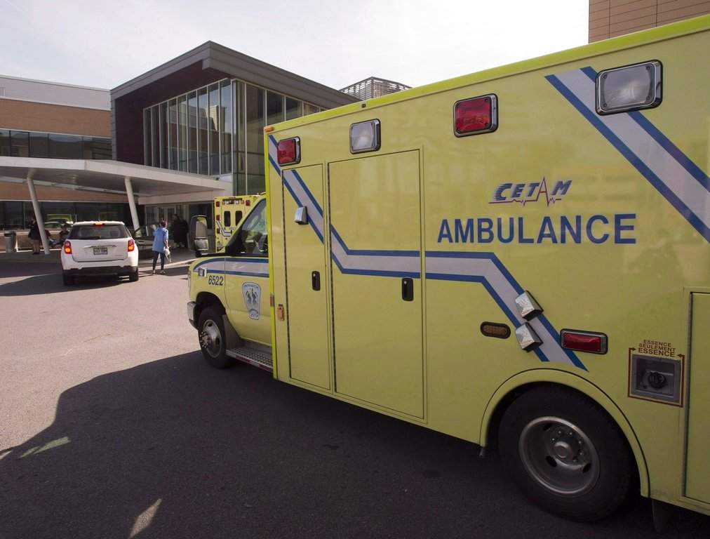 An ambulance drives up to a hospital on September 9, 2014, in Longueuil, Que. 