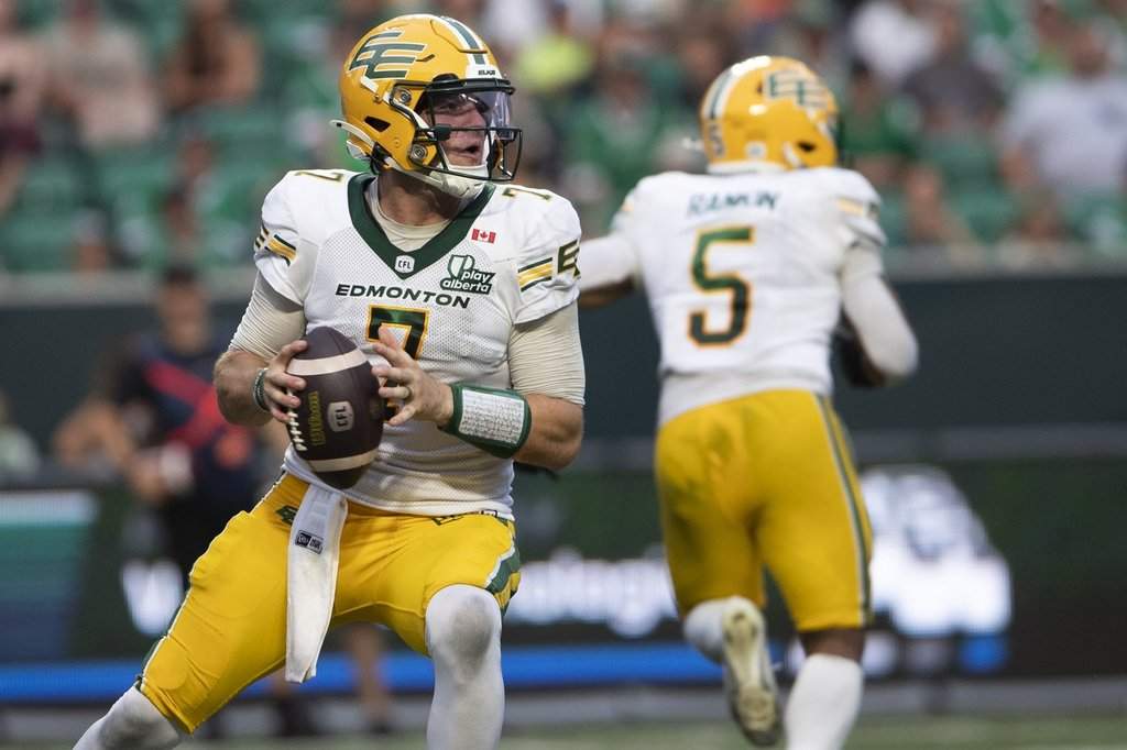 Edmonton Elks quarterback Cody Fajardo (7) looks to make a pass during first-half CFL football action against the Saskatchewan Roughriders in Regina on Thursday, July 23, 2026. THE CANADIAN PRESS/Kayle Neis.