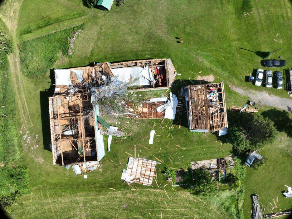 Drone footage by the Northern Tornadoes Project shows roof damage to a large barn caused by an EF0 tornado in Verona, Ont., on June 30.