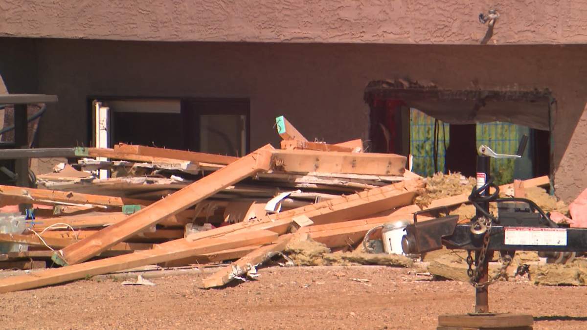 The mayor of Tofield expects the cleanup from the flooding to take months.