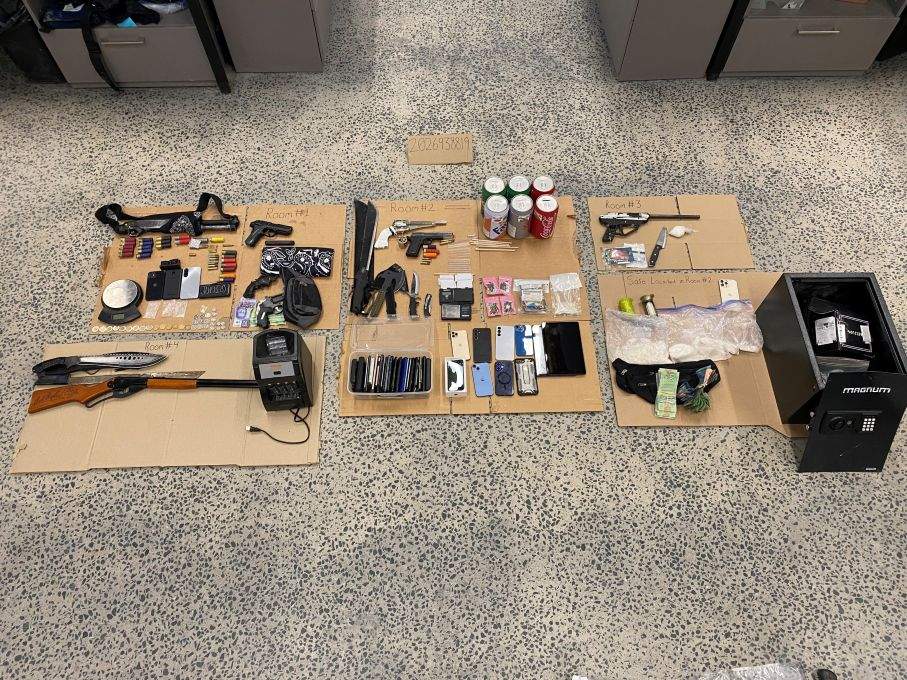 A tactical axe, cash, and drugs were among the items seized by the Pelican Narrows RCMP.