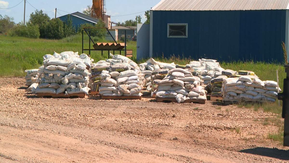 While the floodwaters have largely receded, the piles of sandbags outside Tofield Packers is evidence of the fierce battle area residents were forced to fight against the rising waters.