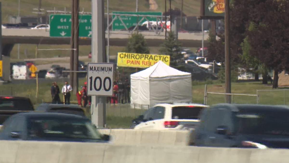 A police tent was set up Wednesday afternoon in a green space on the east side of Deerfoot Trail, not far from where the body of a child, believed to be Parker, was found.