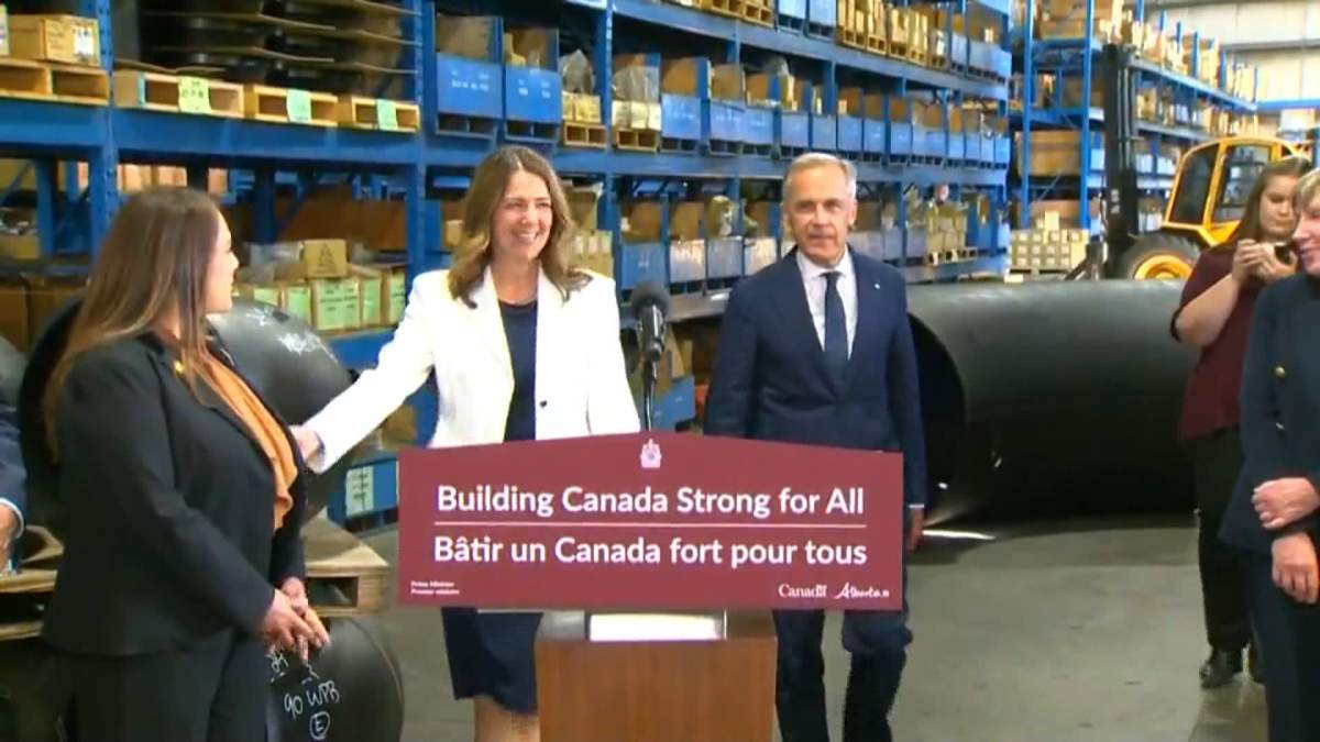 Prime Minister Mark Carney and Alberta Premier Danielle Smith arrived together at the press conference in Calgary where they announced plans to build a new oil pipeline from Alberta to the B.C. coast as a private-public partnership.
