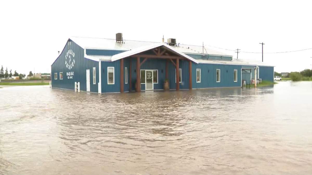 The owners of Tofield Packers, seen here near the peak of the floodwaters, estimates they used over a thousand sandbags to keep the rising waters at bay.
