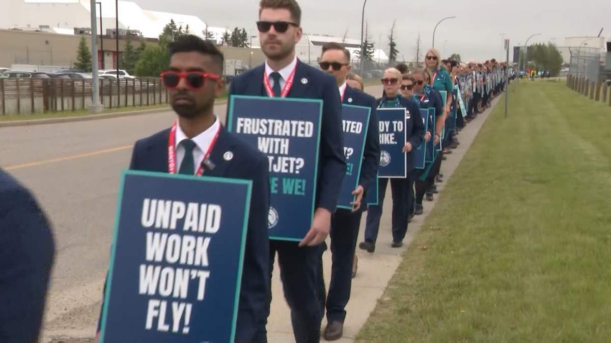 Dozens of flight attendants from Westjet and Westjet Encore held an information picket outside the Westjet Campus at Calgary International Airport on Tuesday.