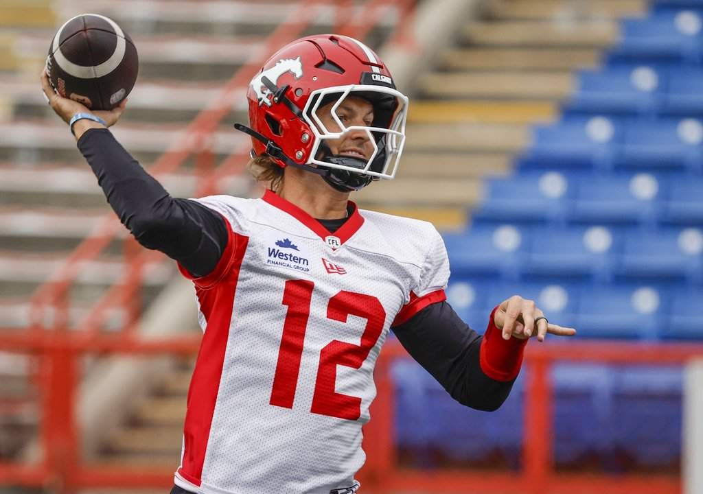 Calgary Stampeders quarterback Josh Love throws the ball during opening day of training camp in Calgary, Sunday, May 10, 2026.THE CANADIAN PRESS/Jeff McIntosh.
