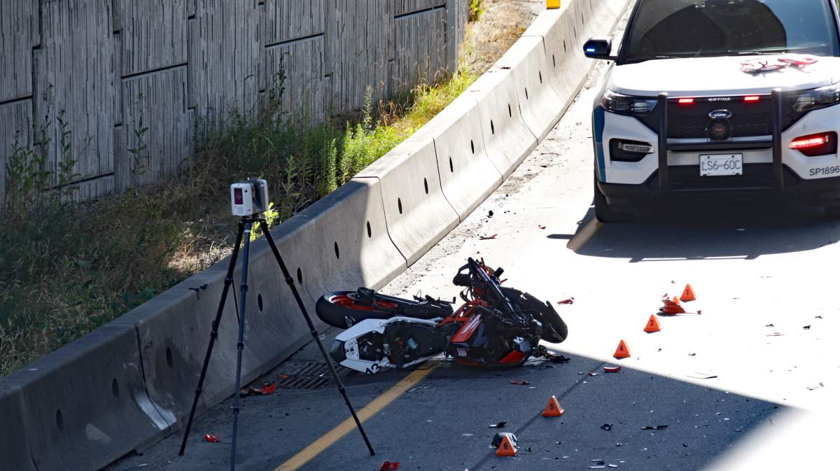 The motorcycle fled into oncoming traffic and collided with a car in Surrey.