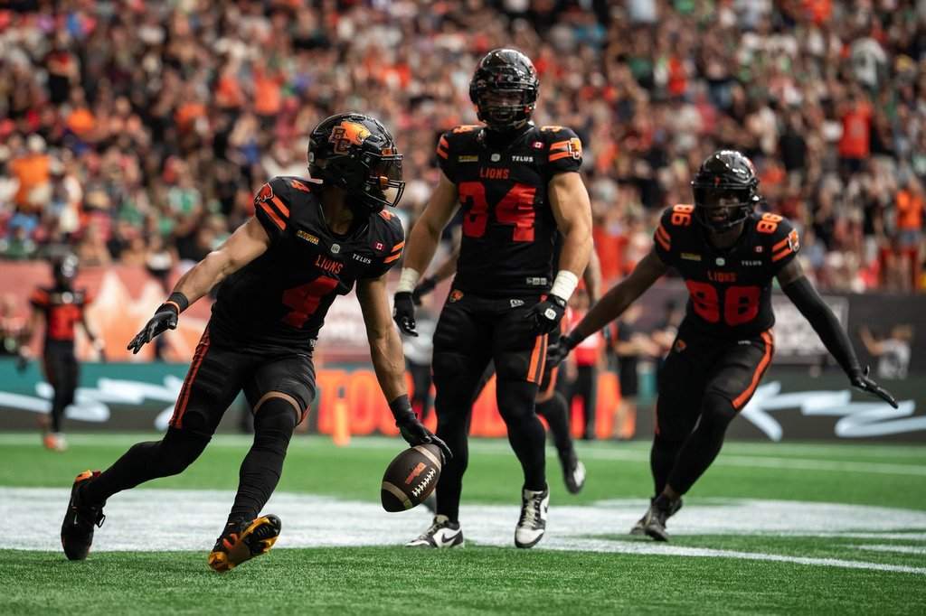BC Lions' Keon Hatcher Sr. celebrates a touchdown against the Saskatchewan Roughriders with his teammates during the second half of a CFL football game in Vancouver on Sunday, August 23, 2026. THE CANADIAN PRESS/Ethan Cairns.