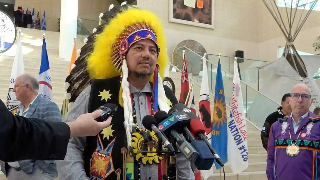 Confederacy of Treaty Six First Nations Grand Chief Joey Pete speaks to reporters at Edmonton city hall on Monday, Aug. 17, 2026. Chief Pete is calling on the Alberta government to show more respect after no government official attended a ceremony marking the 150th anniversary of the signing of Treaty 6 in Edmonton. THE CANADIAN PRESS/Jack Farrell.
