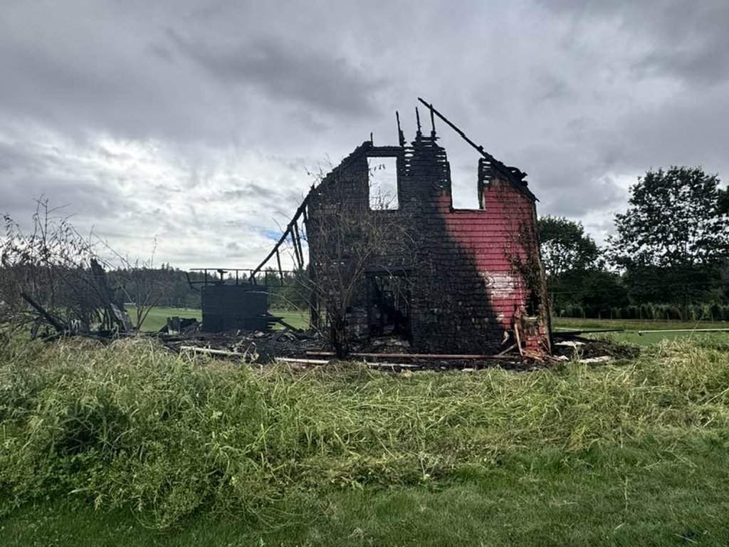 A heritage house, shown in this Thursday, Aug. 27, 2026 handout photo, that stood for more than 130 years in Township of Langley, B.C., has burned down. 