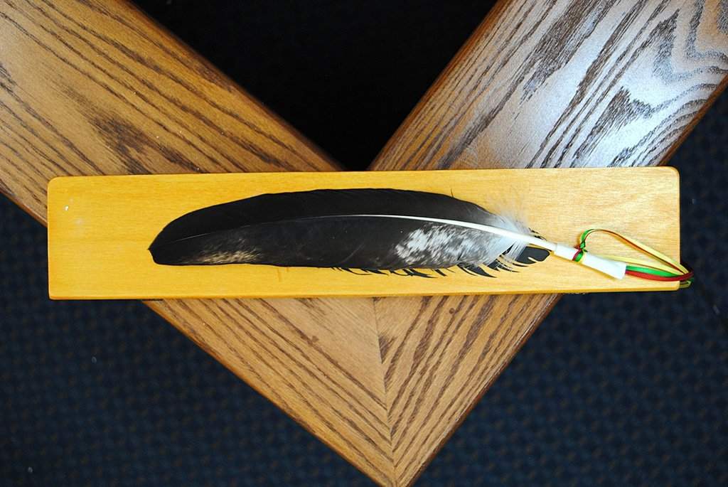 An eagle feather is pictured in a Saskatchewan courtroom in an undated handout photo. The Provincial Court of Saskatchewan says it was gifted 14 eagle feathers and that they will now be available for use during proceedings at each of the court's 13 permanent locations. THE CANADIAN PRESS/Handout - Provincial Court of Saskatchewan (Mandatory Credit).