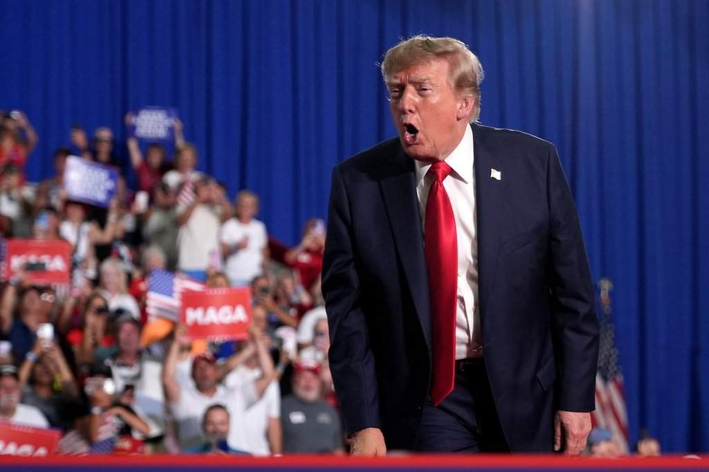 President Donald Trump addresses the crowd as he departs a campaign rally for Sen. Darline Graham, R-S.C., at the Myrtle Beach Convention Center in Myrtle Beach, S.C., on Aug. 21, 2026. (AP Photo/Jacquelyn Martin)