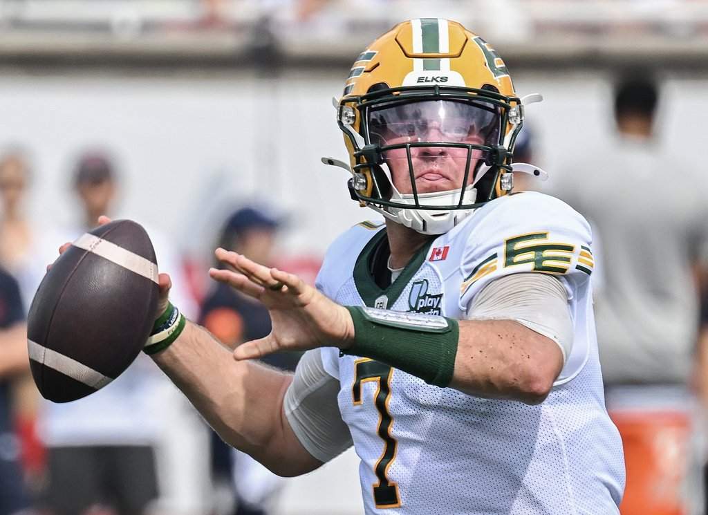 Edmonton Elks quarterback Cody Fajardo throws a pass during first half CFL football action against the Montreal Alouettes in Montreal, on Saturday, Aug. 8, 2026. THE CANADIAN PRESS/Graham Hughes.
