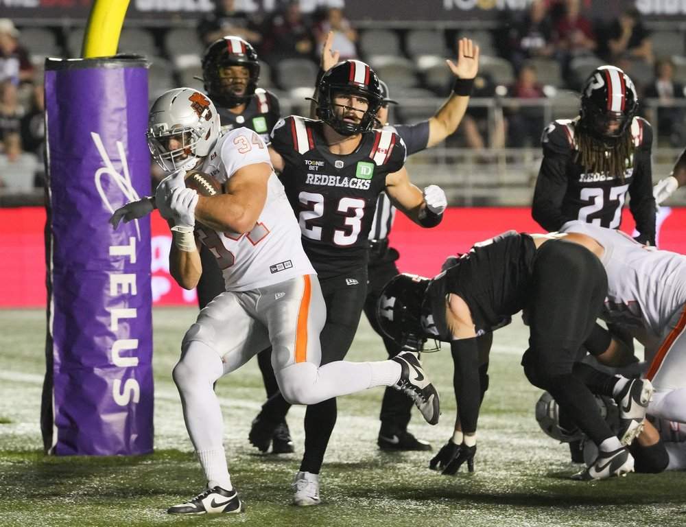 B.C. Lions running back Zander Horvath (34) scores a touchdown during first half CFL action against the Ottawa Redblacks in Ottawa, Sunday, Aug. 30, 2026. THE CANADIAN PRESS/Chris Tanouye.