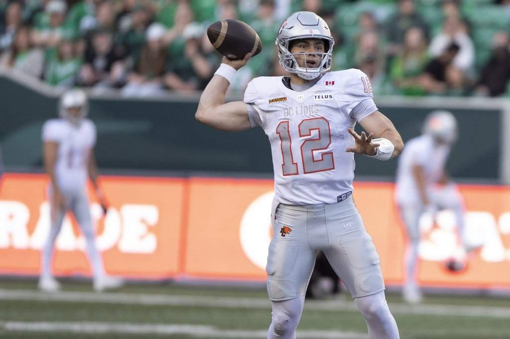 BC Lions quarterback Nathan Rourke (12) lines up a pass during second half CFL football action in Regina on Saturday, June 13, 2026. THE CANADIAN PRESS/Kayle Neis.
