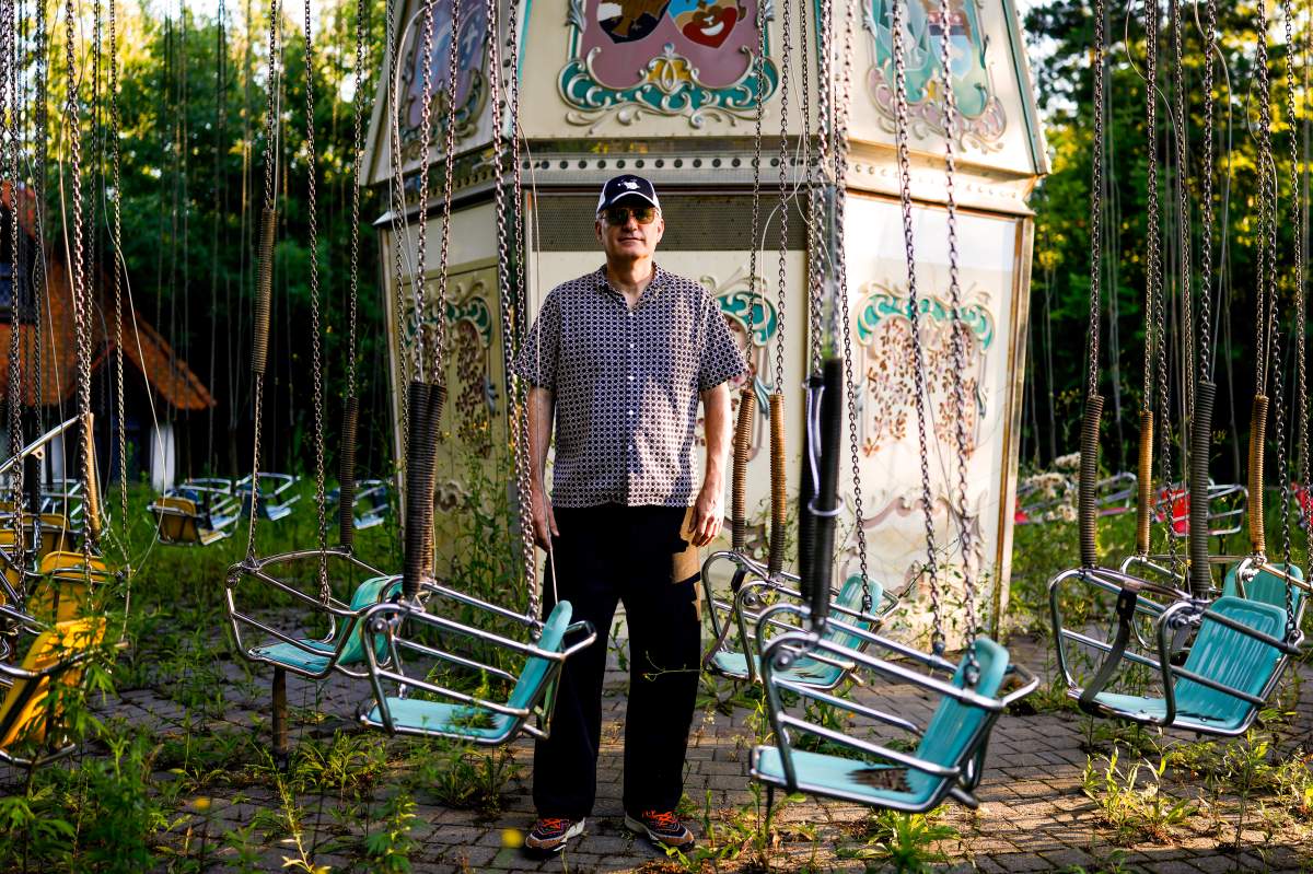 Marineland lawyer Andrew Burns poses for a photo in front of the swing at Marineland in Niagara Falls, Ont., Monday, Aug. 3, 2026.