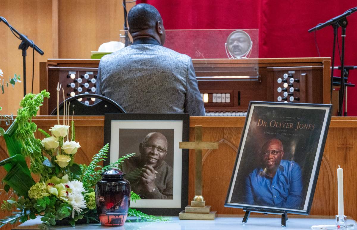 The urn and portraits of Quebec jazz musician Oliver Jones are placed for his funeral at Union United Church in Montreal on Thursday, Aug. 20, 2026. The award-winning pianist died July 22 at age 91.