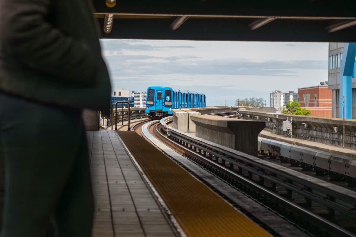 Riders wait for an LRT train at a transit station in the east end of Toronto on May 23, 2022. The Scarborough line was permanently shut down after a derailment in July 2023.