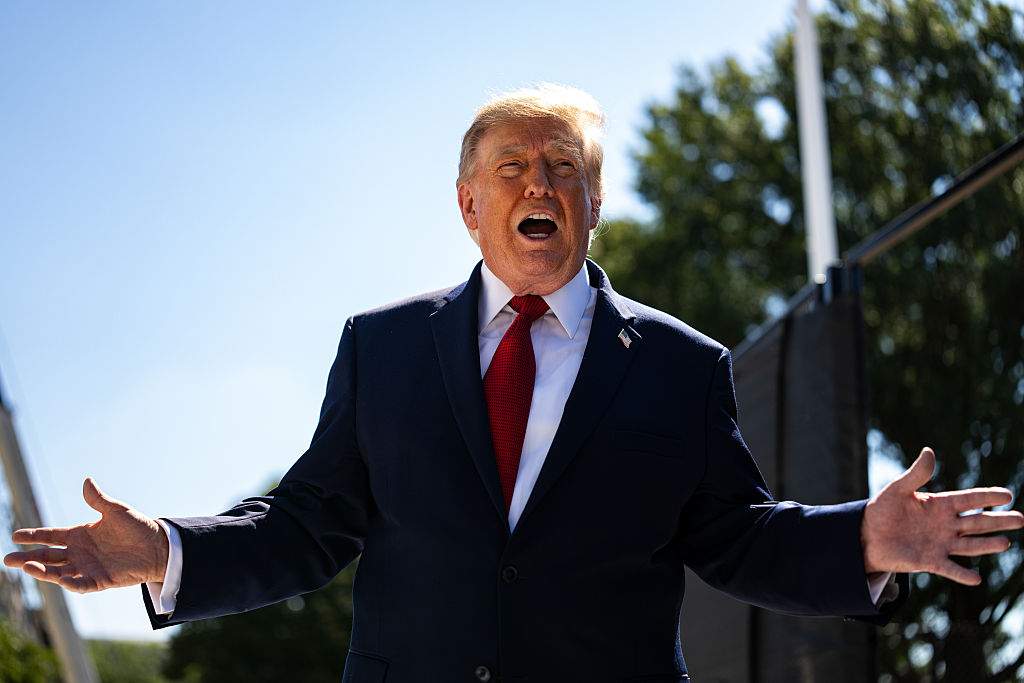 U.S. President Donald Trump speaks to members of the media near the White House helipad construction on the South Lawn of the White House in Washington, DC, US, on Wednesday, Aug. 19, 2026.