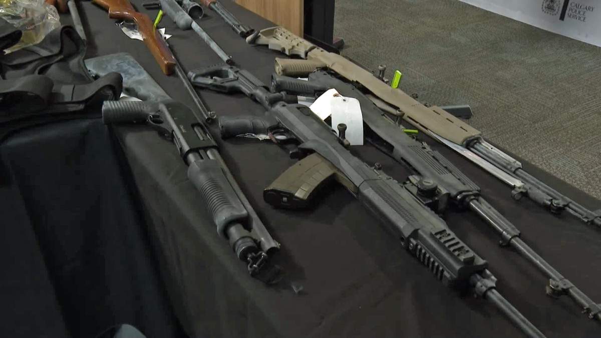 The 11-month-long investigation by Calgary police resulted in a total of almost 60 charges being laid against 8 people for weapons, drugs and other offences.