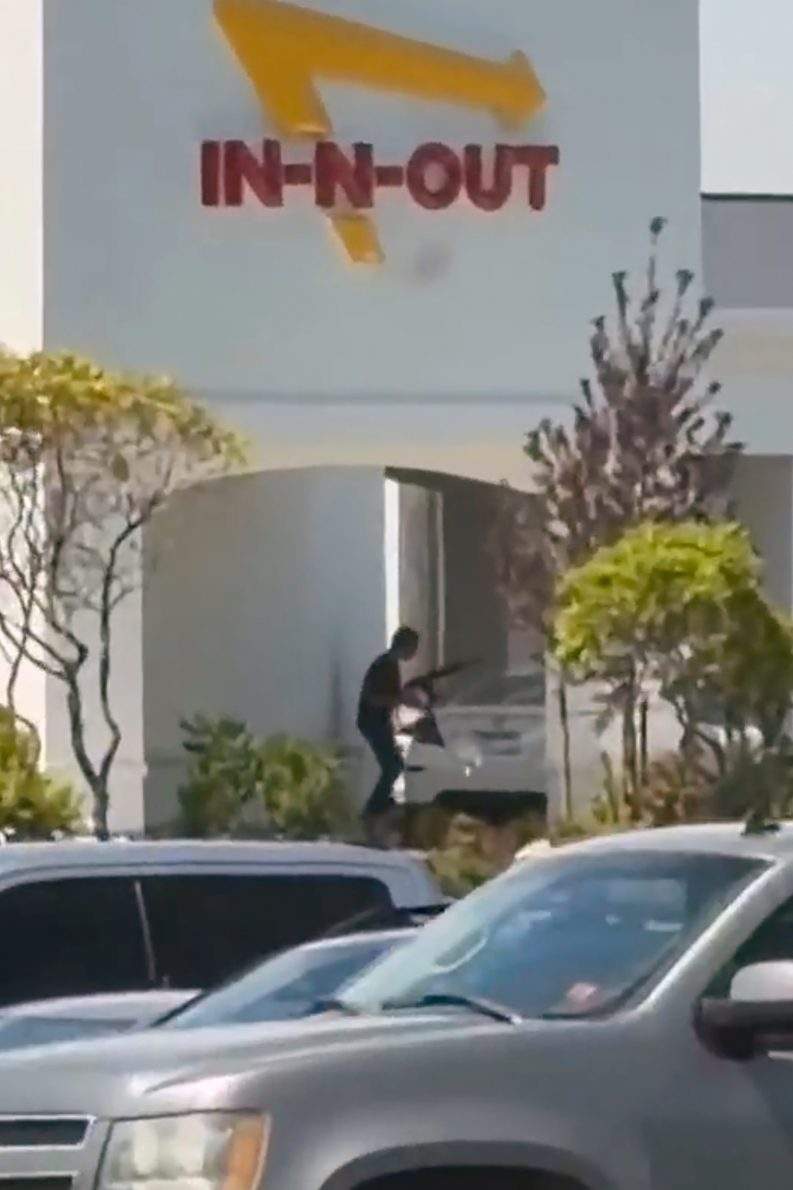 This still image captured from video by a witness shows the scene of a shooting that started at an In-N-Out Burger restaurant, Saturday, Aug. 1, 2026 in Twin Falls, Idaho.