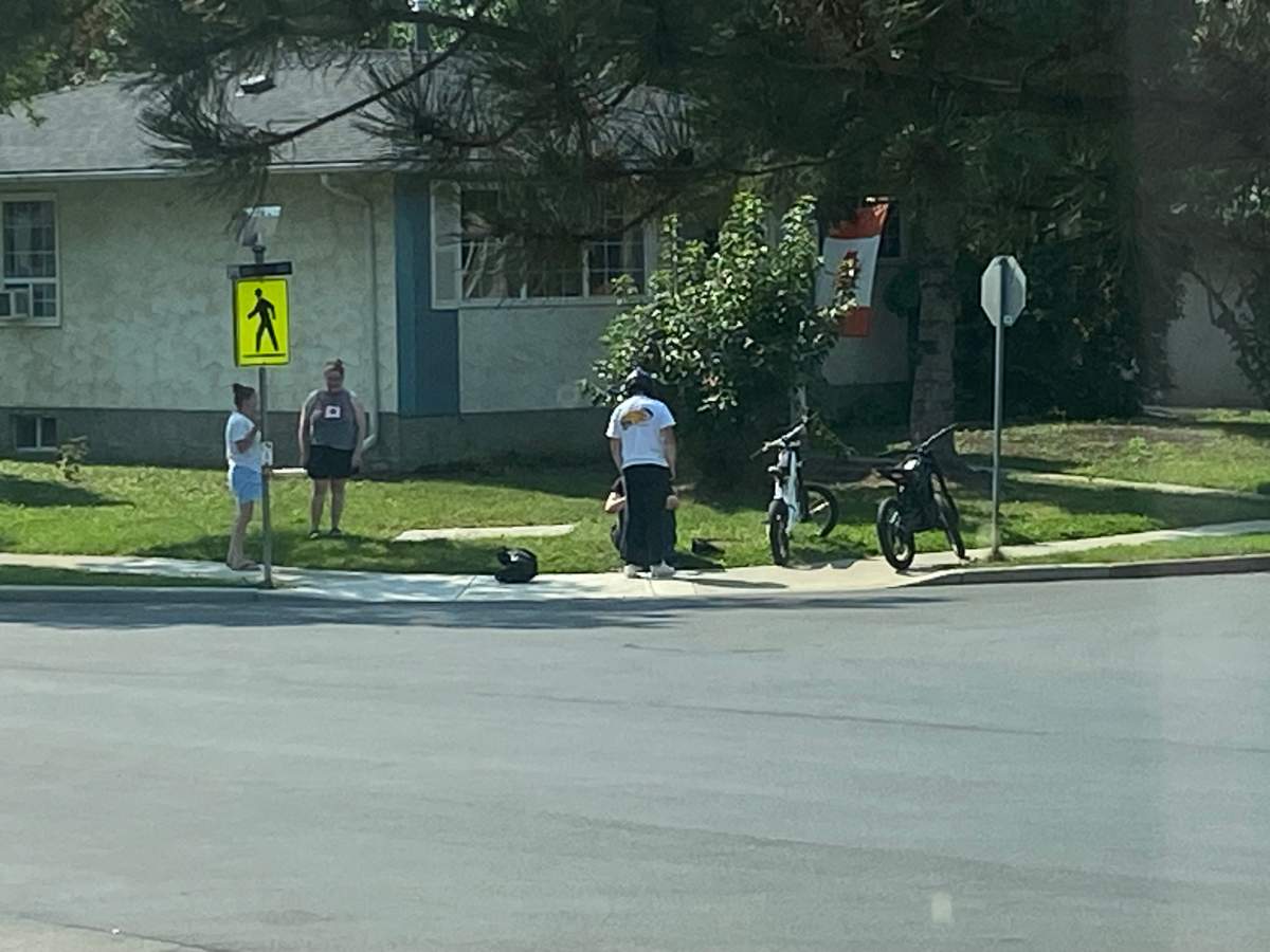 Scene of a collision between an electric dirt bike and a Fort Bronco SUV in St. Albert, Alta. on Thursday, Aug. 27, 2026.